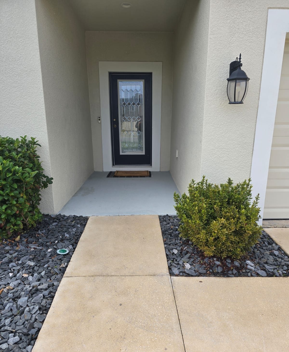 Front entry walkway after pressure washing by Aqua Blast