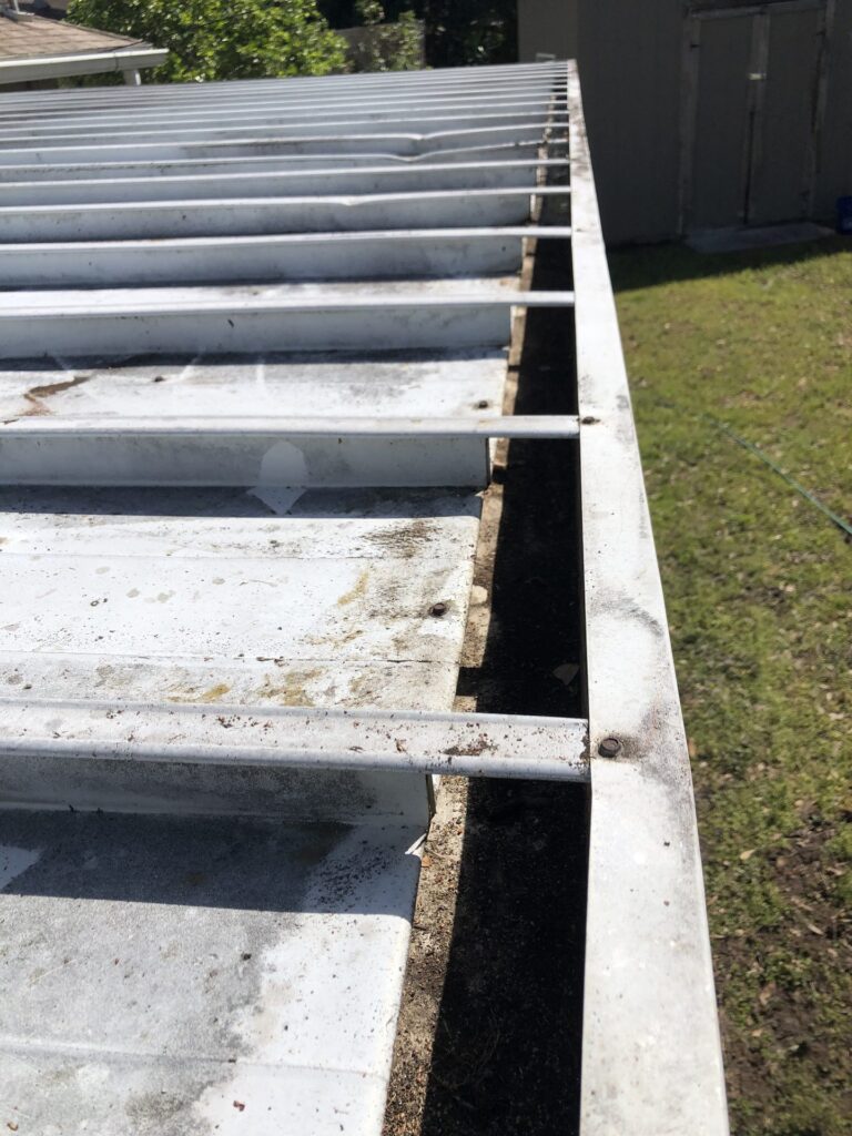 Gutter after cleaning by Aqua Blast, debris removed