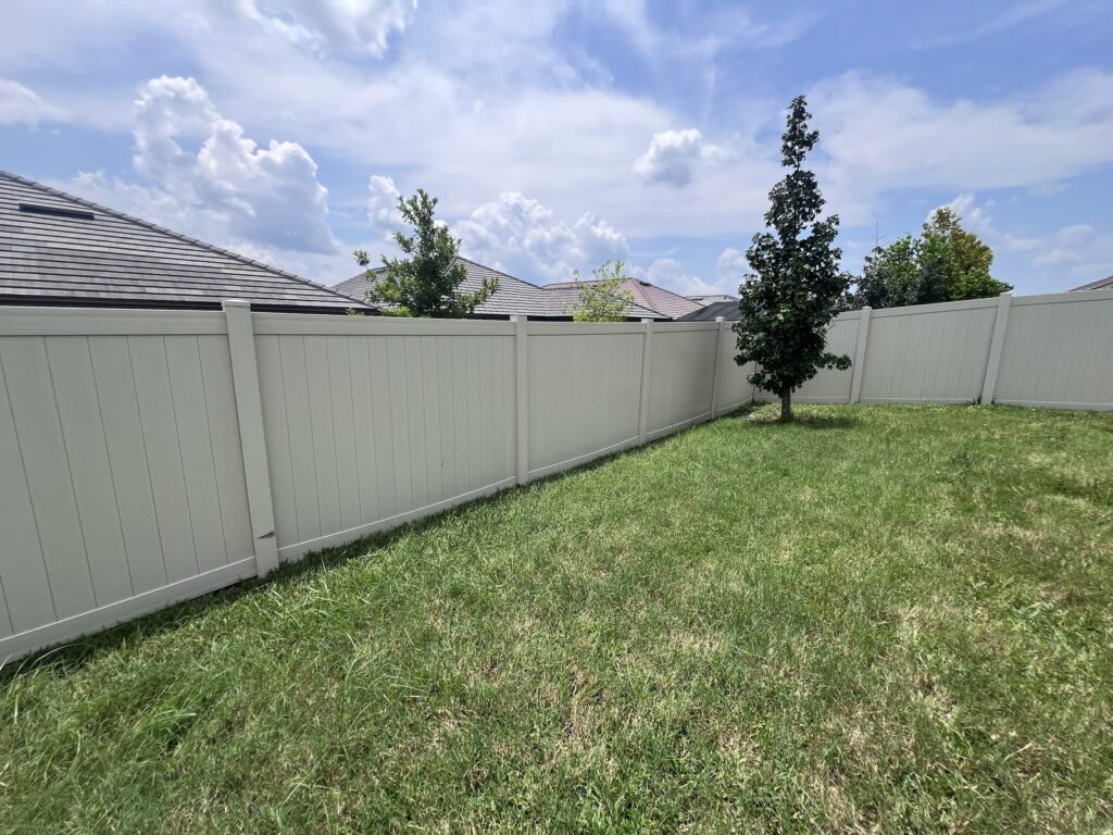 The same vinyl fence after an Aqua Blast soft wash